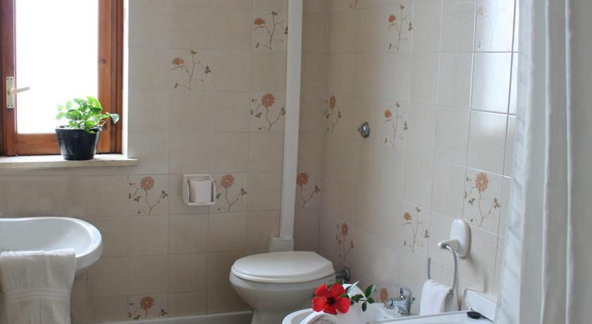 Camere con bagni privati al villaggio a scalea
