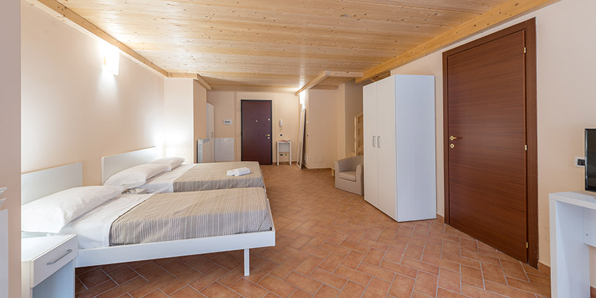 Camera Trilocale Residence Corno Piccolo, ideale per famiglia