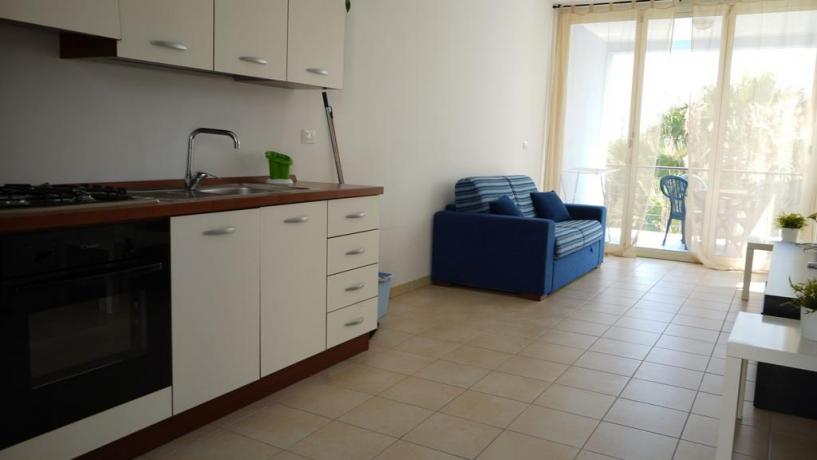 Villaggio con appartamenti cucina e divano letto