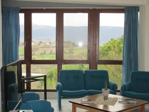 Sala comune in hotel a Collevalenza per Pellegrini