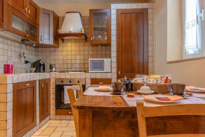 Appartamento con cucina in muratura