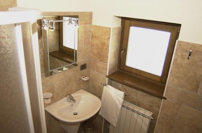 Bagno privato in camera con box doccia