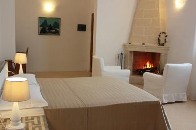 Junior Suite del Corbezzolo con camino