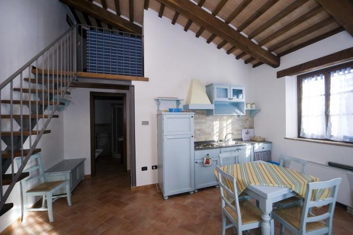 Zona giorno con cucina appartamenti Bolsena