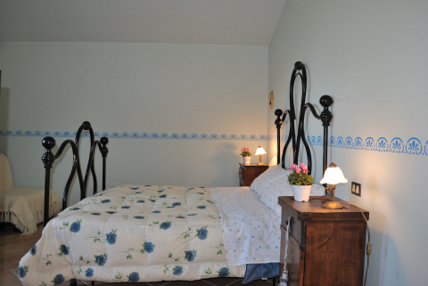 Camera da letto romantica in casale Tadino 