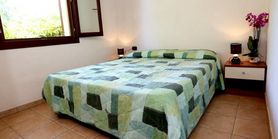 Camera da letto bungalow in Campeggio Villaputzu