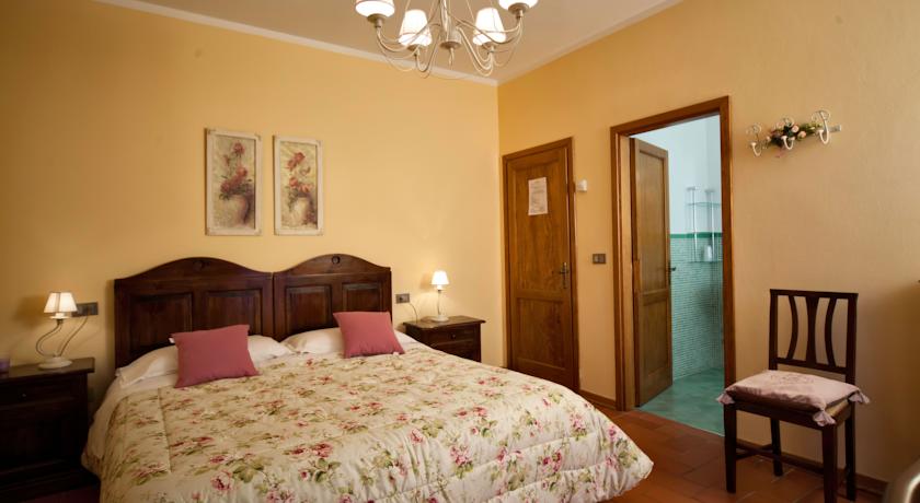 Camere in stile arte povera toscana