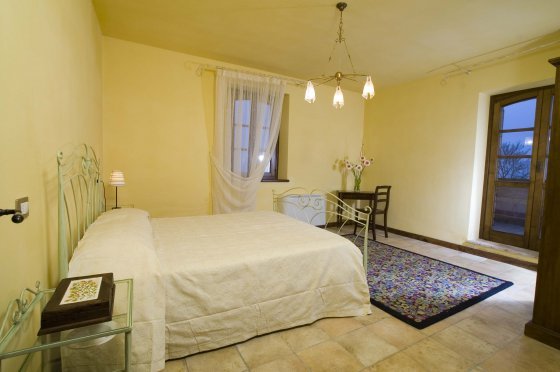 Romantiche camere in appartamentini con camino