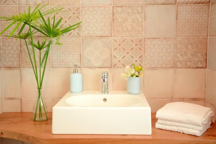 Bagno in camera con asciugamano B&B romano