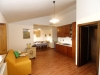 Kitchen and living room in Fiscoli apartment