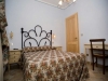 Letto in ferro battuto in agriturismo in Umbria
