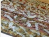 Assaggi di pizza nella trattoria