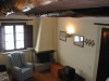 Detail of the living room with fireplace