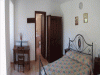 Camera con letto in ferro battuto
