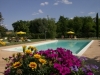 Giardino con piscina e  solarium