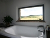 Bagno con vista panoramica dalla camera Villa