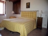 letto con testiera appartamento vacanza (Giallo)