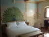 Paintings on the walls of the double bedroom