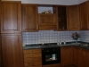 Cucina Atena con piano in marmo verde del Guatemala ed elettrodomestici