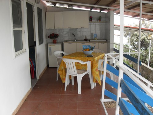 BUNGALOW BILOCALE Prefabbricato in Muratura: Veranda-cucina