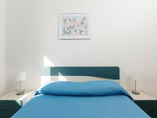 Spaziosa Camera da Letto Matrimoniale nel Residence