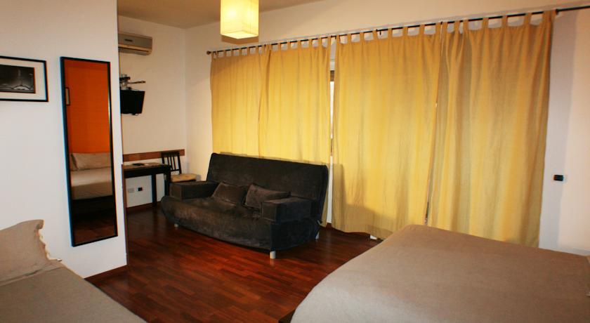 Area soggiorno camera B&B a Roma