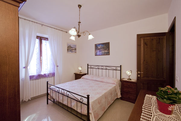 appartamento-fienile-camera da letto-Cortona 