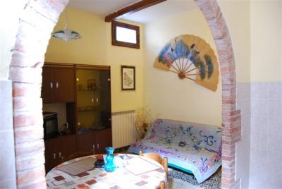 Stanze arredate in stile rustico