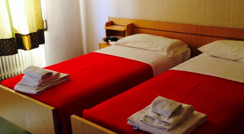 Camere confortevoli con biancheria