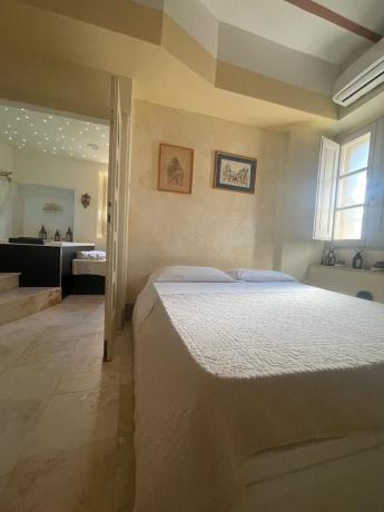 Suite letto king size con TV home-theater Castiglione-del-Lago