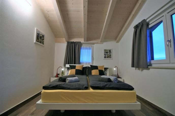 Accogliente camera Trentino Altopiano della Paganella