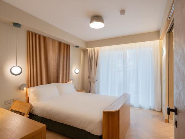 Elegante camera Deluxe hotel con spa San Vito