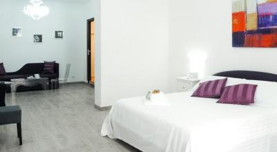 Camere moderne con salotto