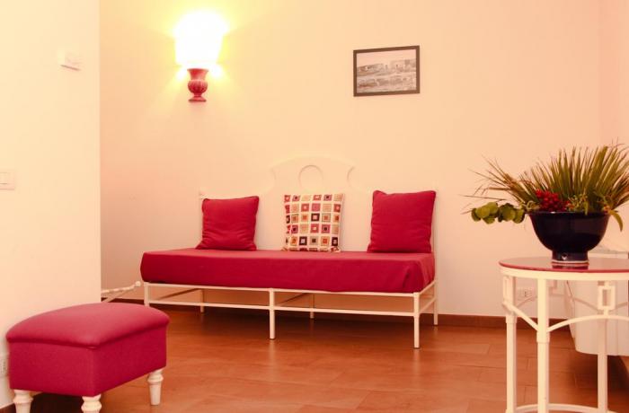 Soggiorno in camera con divano Hotel Sicilia