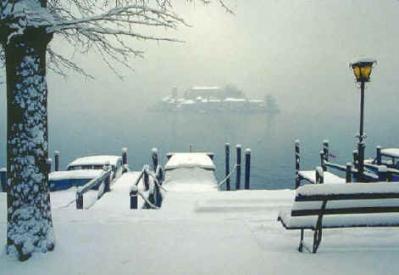 Visit the Orta Lake in summer or Winter