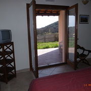 Bilocale camera-portico