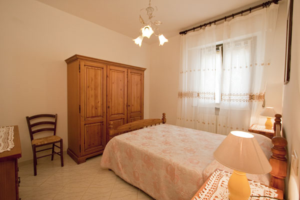 appartamento la Colombaia camera da letto Cortona