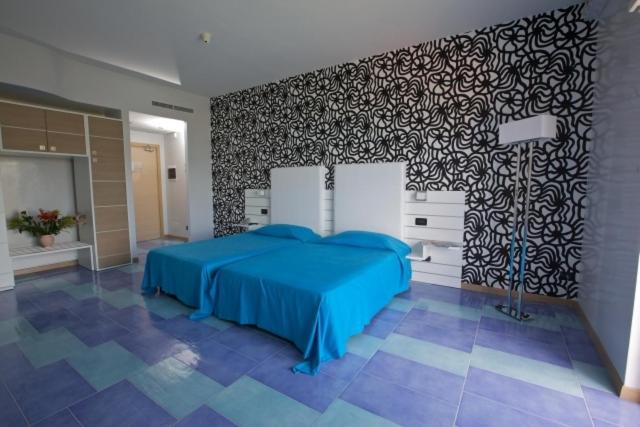 Ampie camere attrezzate Hotel 4 stelle Scario