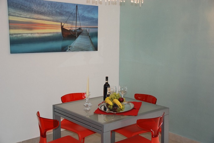 Ampio living con cucina a vista, Suite Family