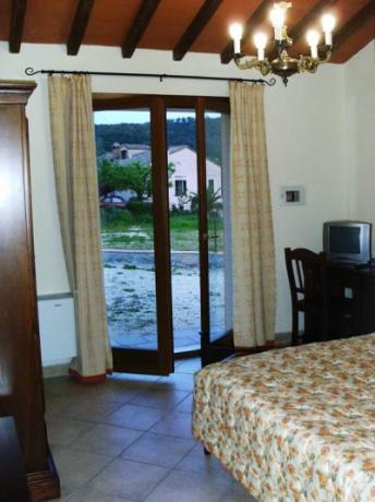 camere piano terra con spazio verde privato