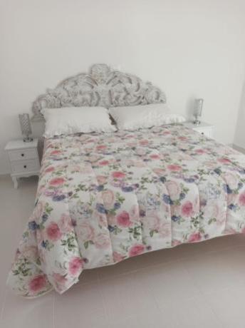 Camera con letto matrimoniale vista-panoramica-attico-Gaeta