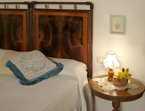 Dettaglio camera matrimoniale Appartamento Margherita