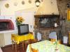 Cucina con Camino, Tv e Forno a Legna