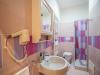 Bagno privato con asciugacapelli e biancheria