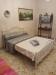 Zona notte con Letto Matrimoniale in Appartamento