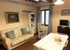 Salone, divano, tavolino e tv junior suite François
