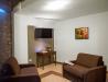 Area relax con tv e poltrone 
