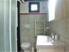 Regina5 Bagno arredato con doccia e lavatrice Ancona
