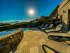 piscina esterna vista lago villa umbria