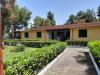 Villaggio con camere e appartamenti piano terra